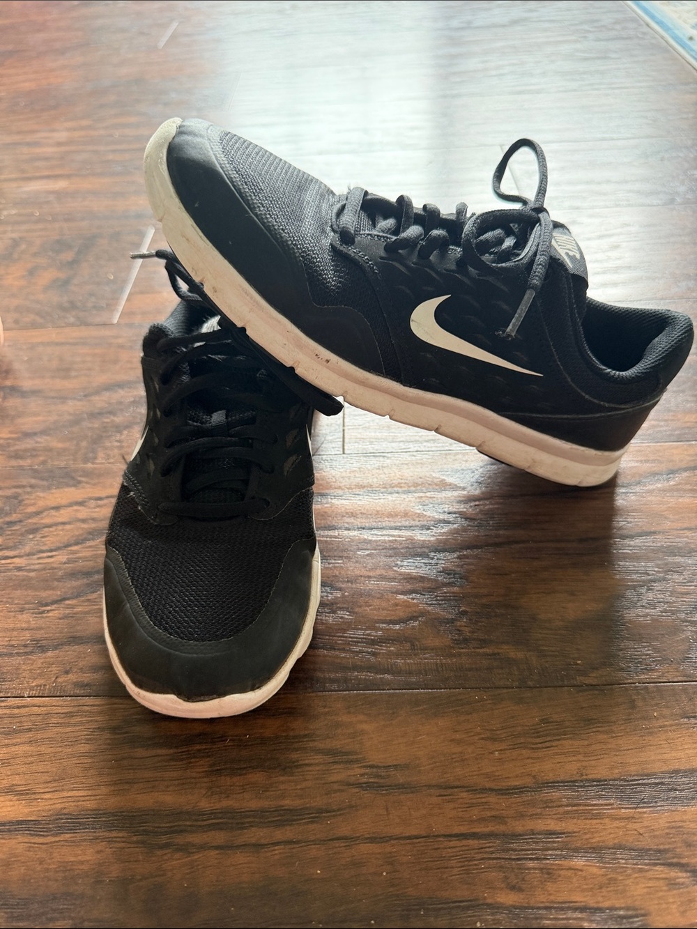 Nike Black Athletic Sneakers with White Swoosh